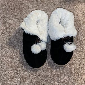 Black and white cozy slippers.